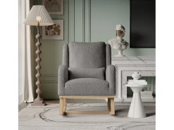 Mecedora moderna en tela de peluche con asiento acolchado de espuma y estructura de madera.