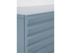 Mueble tv beige con relieve ondulado en las puertas