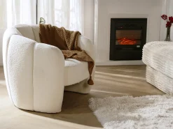 Sillón con forma de concha en chenilla color beige DELIPO