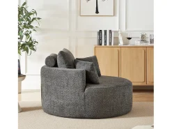 Sillón con soporte lumbar y reposacabezas, tapizado en tela de chenilla gris.