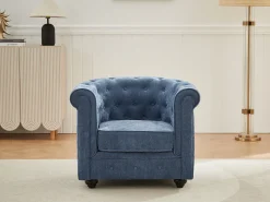 Sillón de tela color azul forma mítica CHESTERFIELD
