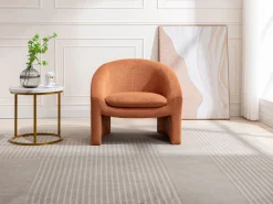 Sillón de tela color terracota estilo diseño OSSANA