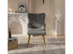 Sillón escandinavo con respaldo alto y reposapiés en tejido bouclette, gris