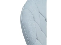 Sillón giratorio tapizado en color azul claro y patas metálicas
