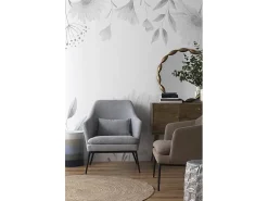 Sillón tapizado color gris perla con cojín y patas de metal negras