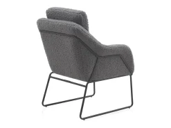 Sillón tapizado color gris con patas metálicas negras
