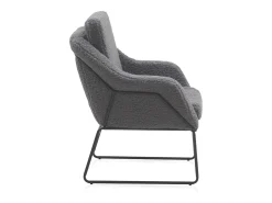 Sillón tapizado color gris con patas metálicas negras