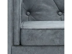 Sillón tapizado de tela gris