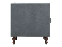 Sillón tapizado de tela gris