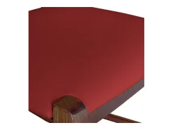 Taburete de 80 cm de altura en madera de nogal oscuro con asa y asiento acolchado en símil piel roja.
